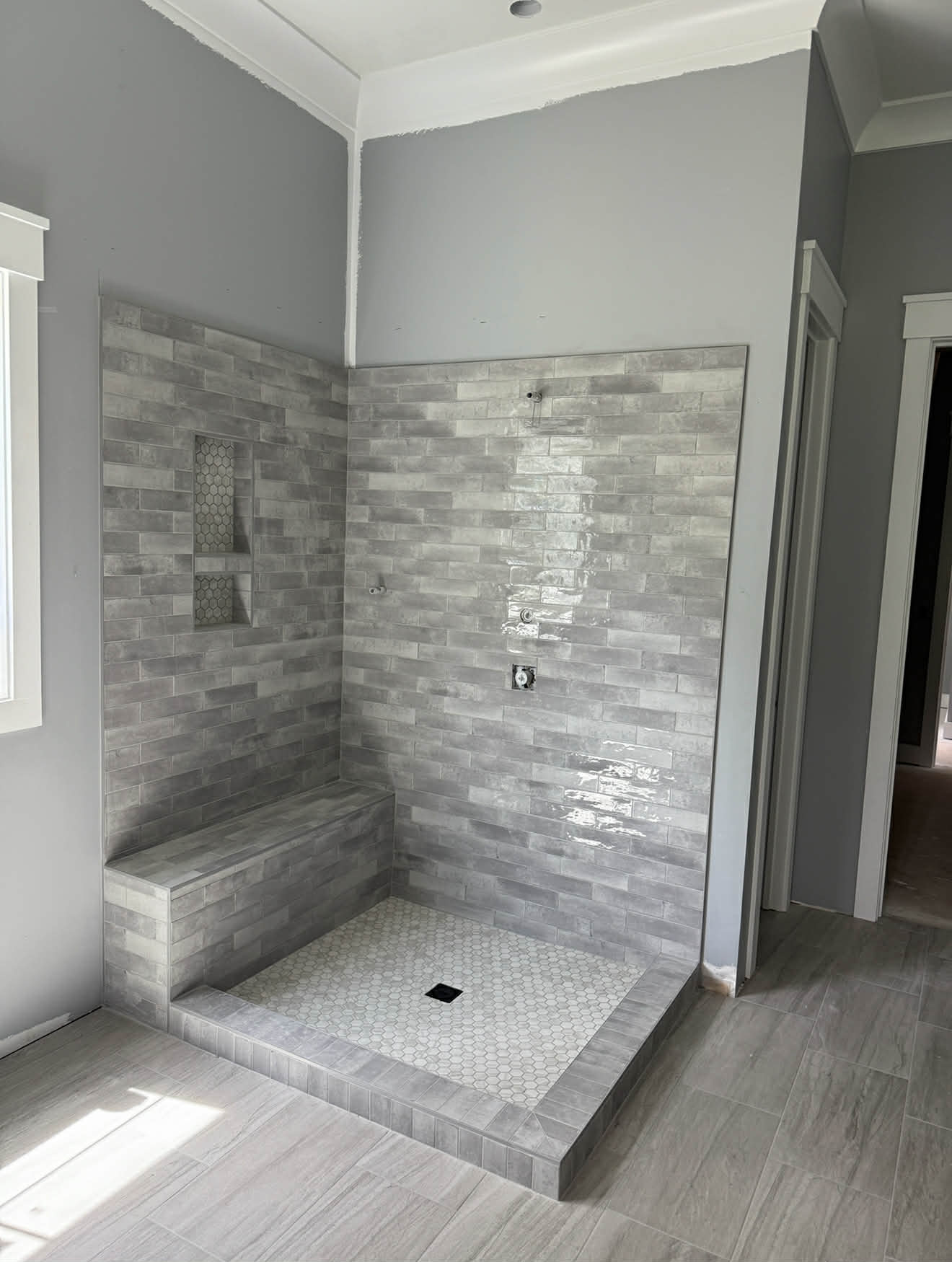 Subway tile shower with bench