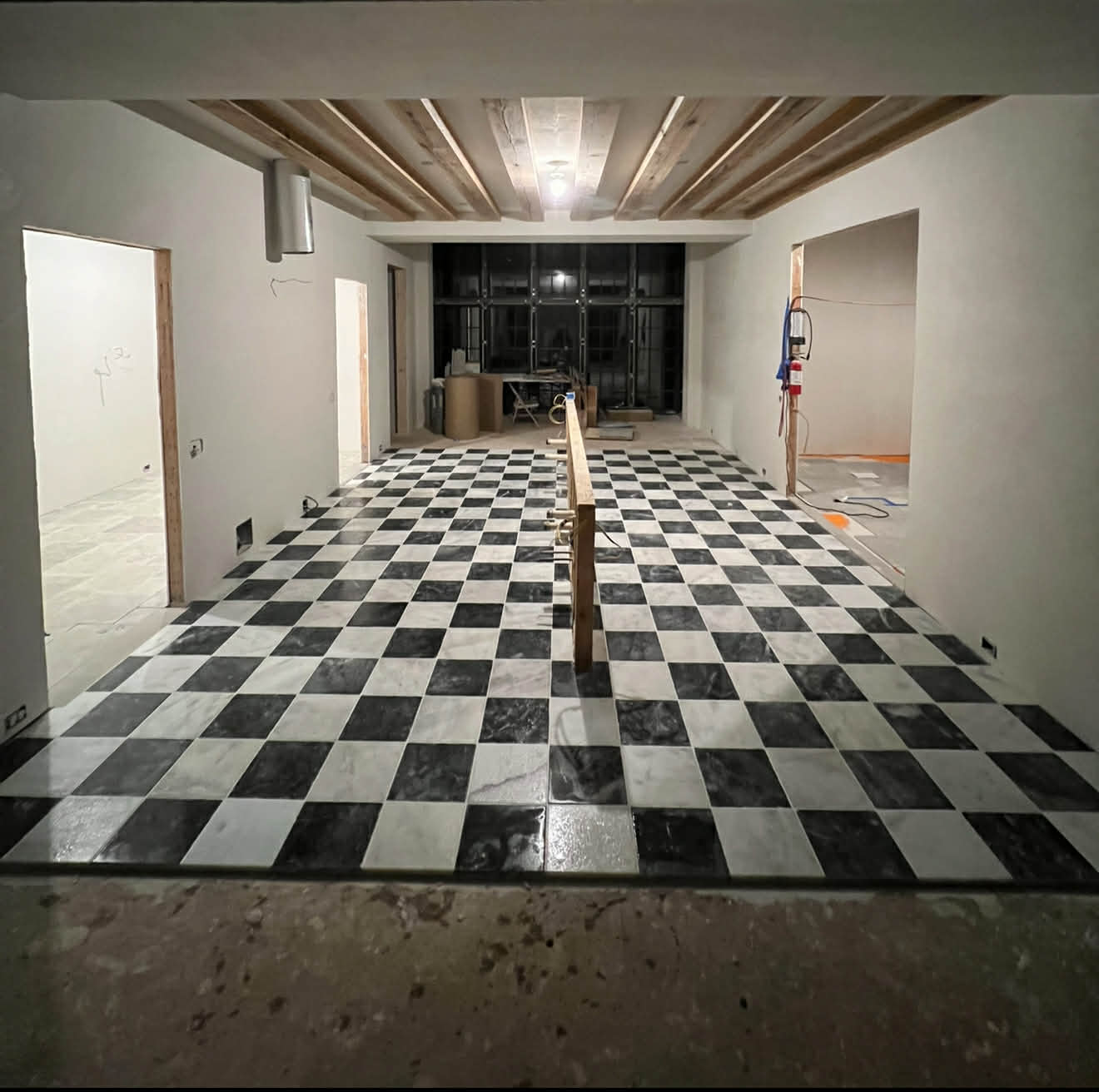 Black and white checkered marble floor — commercial space