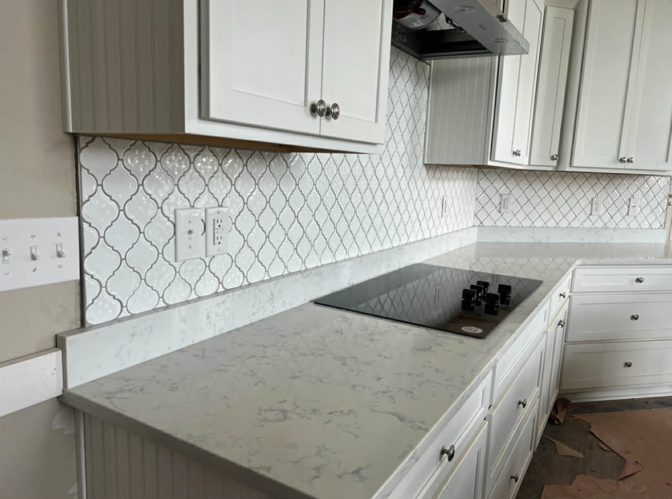 Kitchen arabesque backsplash with marble counter