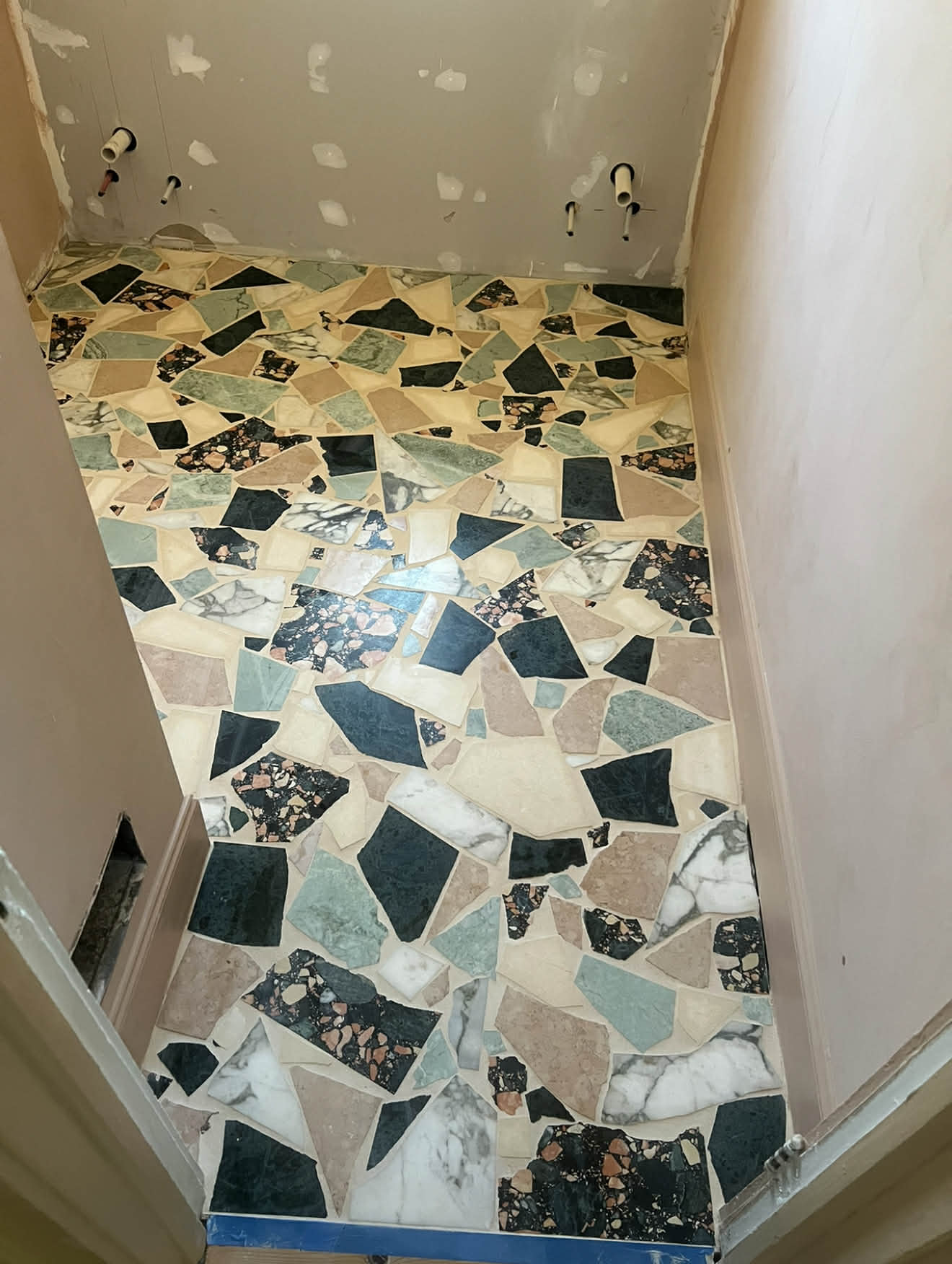 Terrazzo and stone mosaic floor