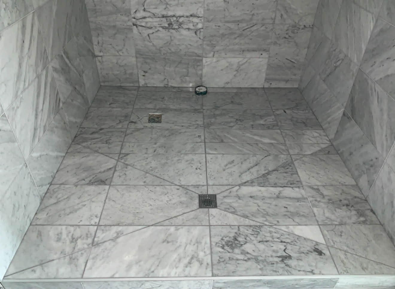 Marble steam shower interior and floor