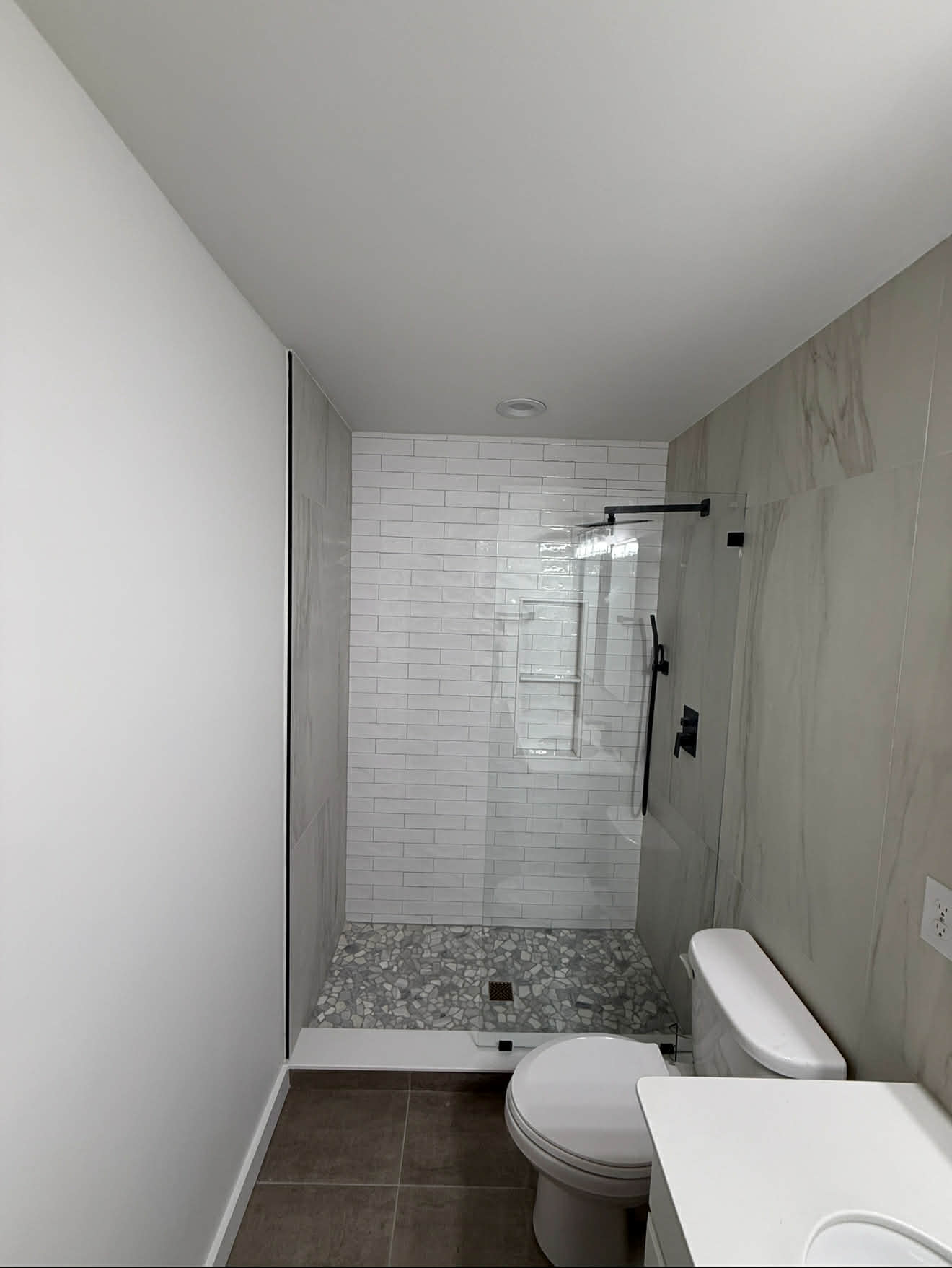 White marble basketweave shower floor