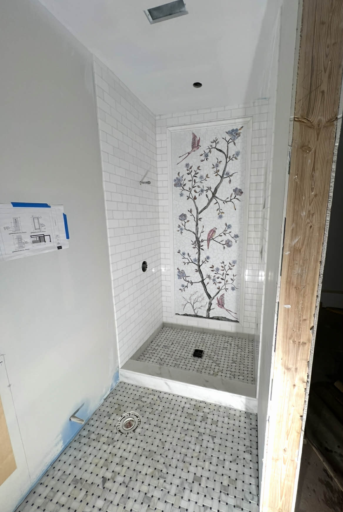 Large format grey stone tile shower
